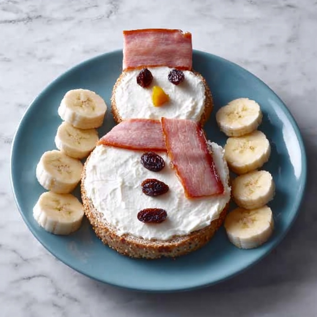 Snowman Breakfast Stack with Eggs, Bacon, and Fruit Recipe - Recipe Image