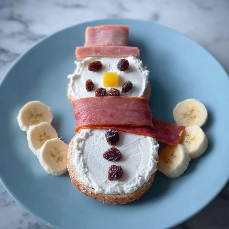 Snowman Breakfast Stack with Eggs, Bacon, and Fruit Recipe