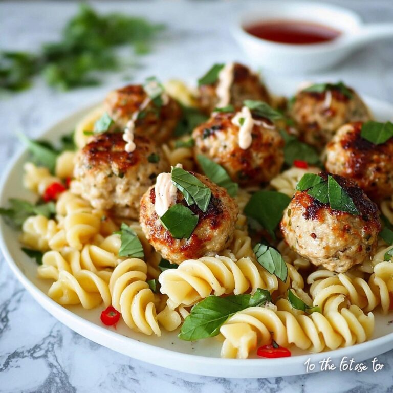 Garlic Butter Chicken Bites with Spicy Cajun Alfredo Twisted Pasta Recipe