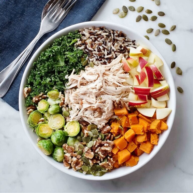 Harvest Bowl with Roasted Sweet Potatoes, Brussels Sprouts, Kale, and Goat Cheese Recipe