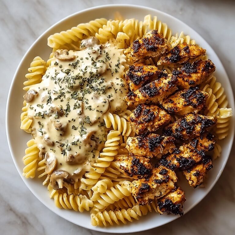 Indulgent Cheesy Alfredo Twisted Pasta with Garlic Butter Chicken Recipe